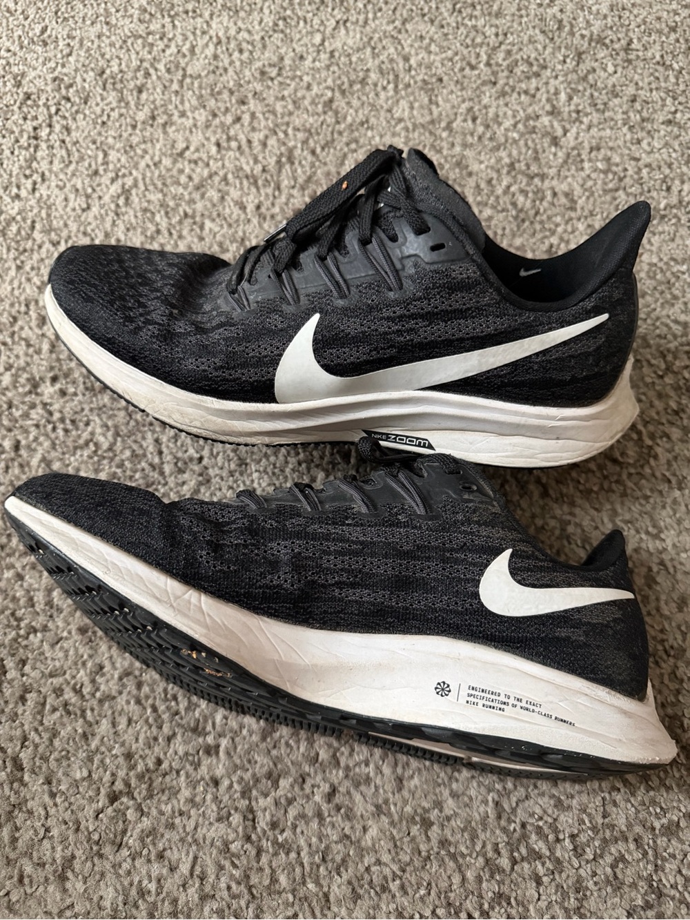 Nike Women’s Black and White Zoom Running Sneakers